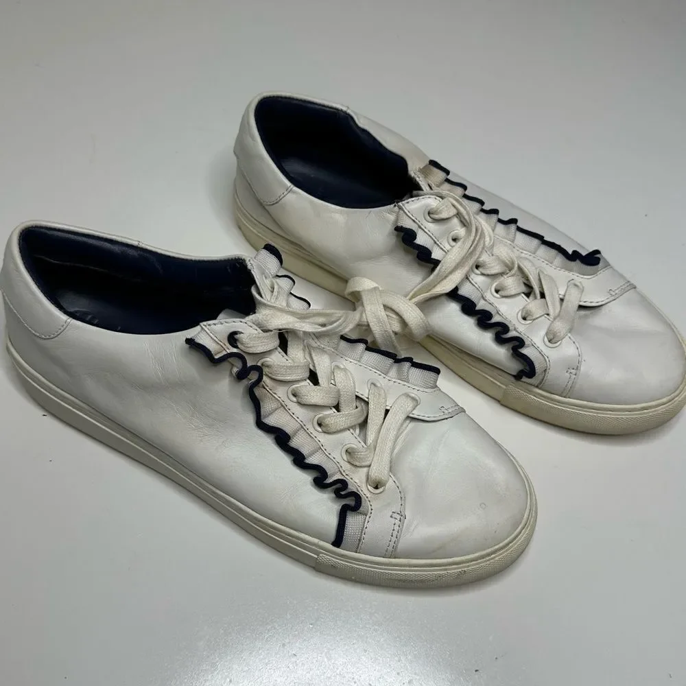 Tory Burch Ruffle sneakers. Size 10M. White with elegant‎ black ruffle.